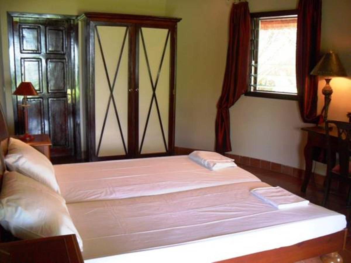 White Horse Residence Tanji Quarto foto